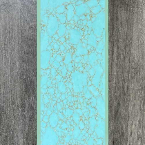 Synthetic turquoise slabs, artificial turquoise flakes, cue rods, inlaid knife handle panels, musical instruments, carved patches