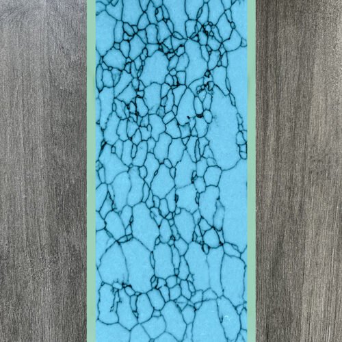 Synthetic turquoise slabs, artificial turquoise flakes, cue rods, inlaid knife handle panels, musical instruments, carved patches