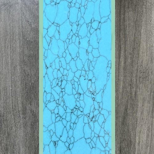 Synthetic turquoise slabs, artificial turquoise flakes, cue rods, inlaid knife handle panels, musical instruments, carved patches