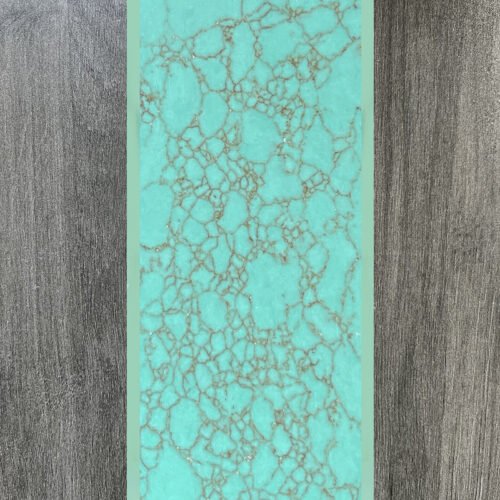 Synthetic turquoise slabs, artificial turquoise flakes, cue rods, inlaid knife handle panels, musical instruments, carved patches