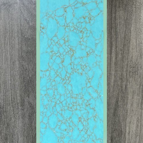 Synthetic turquoise slabs, artificial turquoise flakes, cue rods, inlaid knife handle panels, musical instruments, carved patches