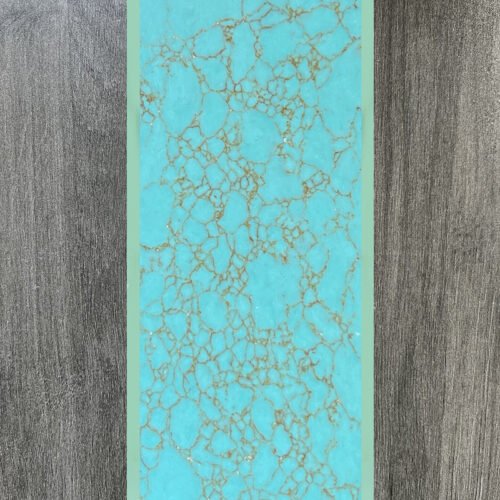 Synthetic turquoise slabs, artificial turquoise flakes, cue rods, inlaid knife handle panels, musical instruments, carved patches