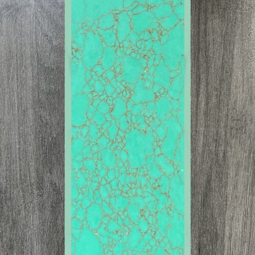 Synthetic turquoise slabs, artificial turquoise flakes, cue rods, inlaid knife handle panels, musical instruments, carved patches