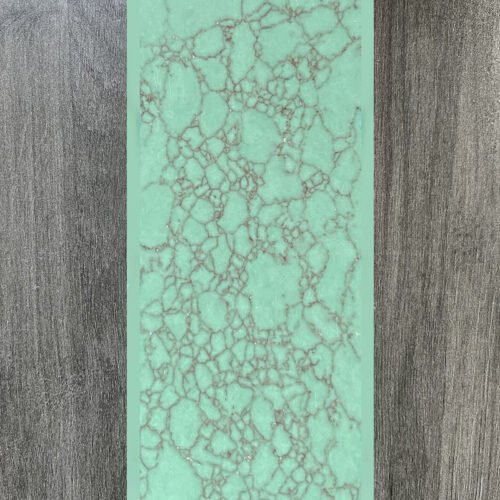 Synthetic turquoise slabs, artificial turquoise flakes, cue rods, inlaid knife handle panels, musical instruments, carved patches