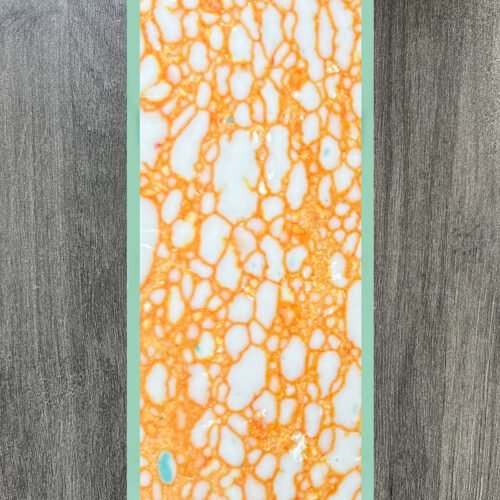 Synthetic turquoise slabs, artificial turquoise flakes, cue rods, inlaid knife handle panels, musical instruments, carved patches